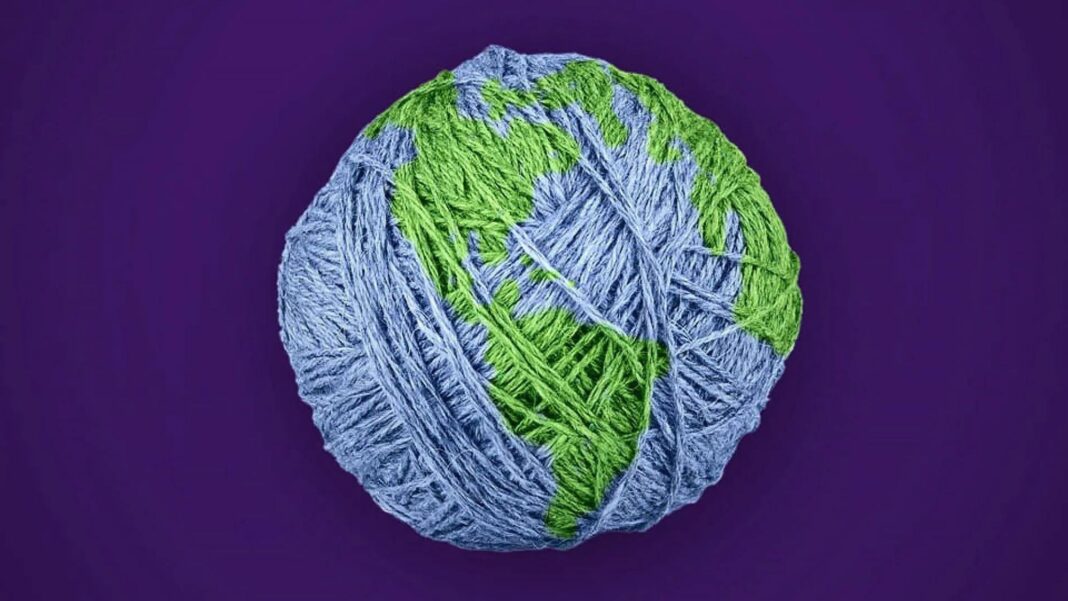 A thread globe showcasing sustainable choices are crucial in textile industry